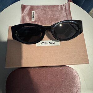 Miu Miu Statement Black Sunnies – Gold Logo Detail